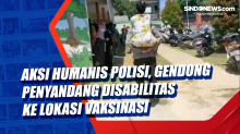 Aksi Humanis Polisi, Gendong Penyandang Disabilitas ke Lokasi Vaksinasi
