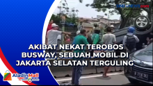 Akibat Nekat Terobos Busway, Sebuah Mobil di Jakarta Selatan Terguling