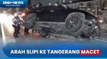 Mobil Mewah Terguling di Tol Dalam Kota Arah Tangerang  Merak