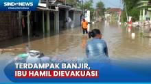 Sungai Lamong Mojokerto Meluap, Petugas Evakuasi Ibu Hamil di Tengah Banjir