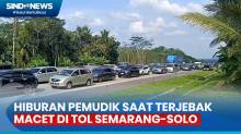 Lambaikan Tangan, Hiburan bagi Pemudik yang Terjebak Macet di Tol Semarang-Solo