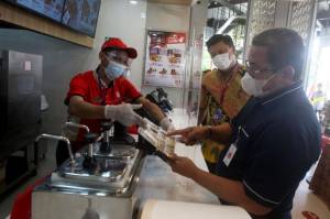 Emiten Pengelola KFC Pangkas Kerugian 50% di Kuartal II-2021