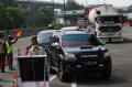 Petugas Gabungan Periksa Ketat SIKM di KM 47 Tol Cikampek Arah Jakarta
