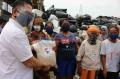 Gerkindo Beri Bantuan Beras dan Masker Untuk Warga Kapuk Jakarta