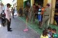 Petugas Gabungan Gelar Razia Masker di Pulau Pramuka