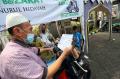 Layanan Zakat Fitrah Drive Thru di Masjid Raya Nurul Hidayah Jakarta