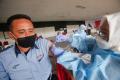 Antusias Warga Ikuti Vaksinasi Covid-19 di Terminal Kampung Rambutan