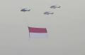 Bendera Merah Putih Raksasa Berkibar di Langit Jakarta