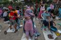 500 Warga Ikuti Kegiatan Mencuci Kaki Ibu Massal