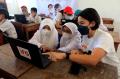 IFG Beri Bantuan 200 Paket Pendidikan di Desa Malasari Bogor