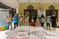 MNC Peduli Berikan Bantuan Beras ke Warga Prasejahtera di Bantaran Sungai Ciliwung