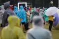 Diguyur Hujan Deras, Penikmat Musik di Joyland Festival 2022 Tetap Enjoy