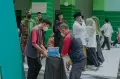 Tim Sapu Bersih AGP Beraksi di Acara 1 Abad NU