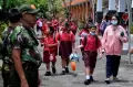 Antisipasi Penculikan Anak, Polisi dan Linmas Dikerahkan Jaga Sekolah