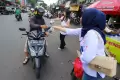 DPW Pemuda Perindo DKI Jakarta Bagi-Bagi Takjil di Kawasan Benhil