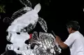 Seni Ukir Es Kampanyekan Kelestarian Alam Laut