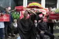 Aksi Cukur Rambut Abraham Samad Usai Ketua KPK Jadi Tersangka