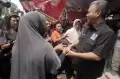 Tim Pemenangan Daerah Ganjar-Mahfud DKI Jakarta Gelar Cukur Rambut Gratis di Kwitang