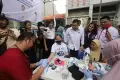 Caleg Partai Perindo Ci Mehong Gelar Bazar Murah dan Cek Kesehatan Gratis di Kalideres